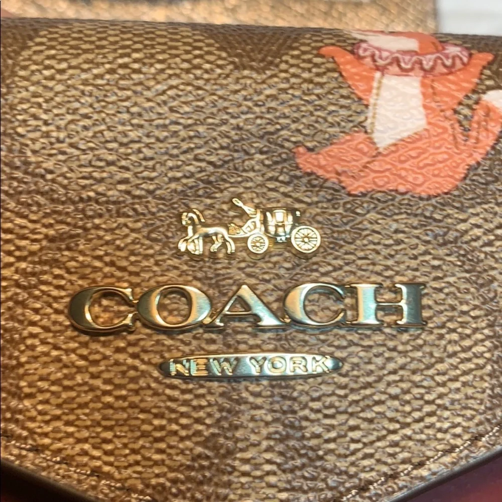 NWT Coach limited edition leashed wallet w/mirror